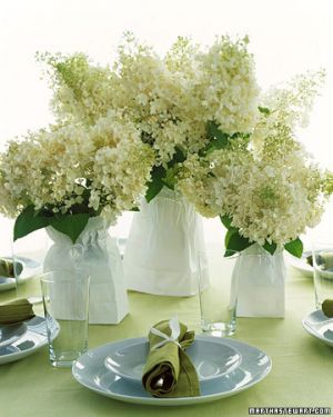 Martha Stewart - white flowers in paper bags on table.jpg